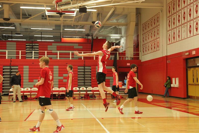 Mens varsity volleyball triumphs against Naperville North
