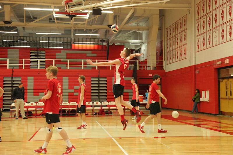 Mens' varsity volleyball triumphs against Naperville North