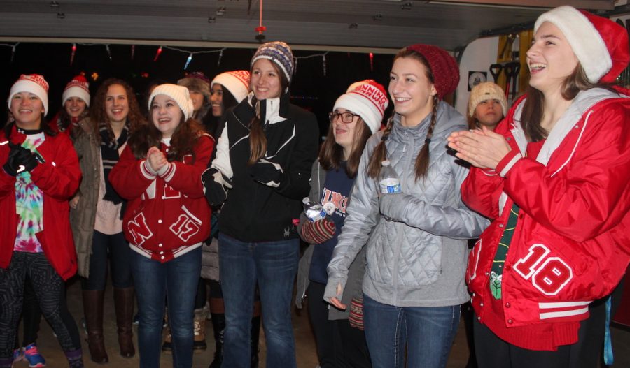 Girls cross country brings music to the holiday season