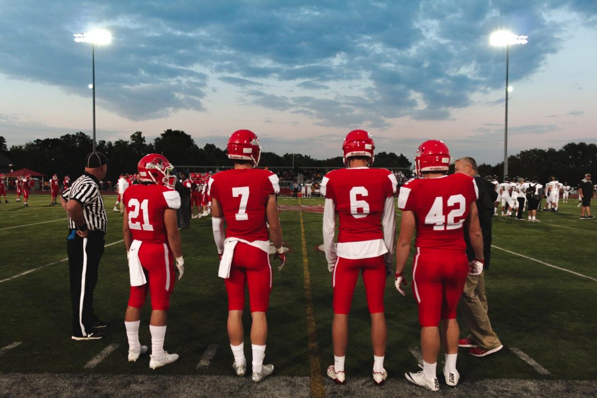 (left to right) Seniors AJ Deinhart, Tommy Coyne, Braden Lindmark and Mike
Oliver show off their new jerseys at the Sept. 8 home game v. Metea Valley. Central won 55-7.