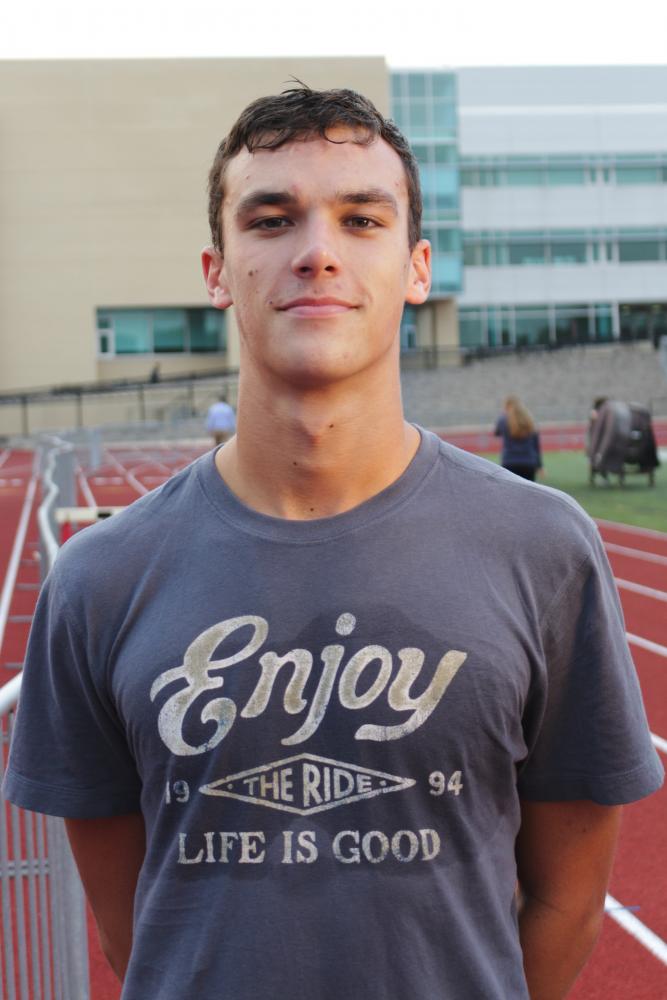 Junior quarterback Payton Thorne (left) and senior wide receiver Jayden Reed (right) transferred to Central’s football team from Metea Valley High School over the summer.