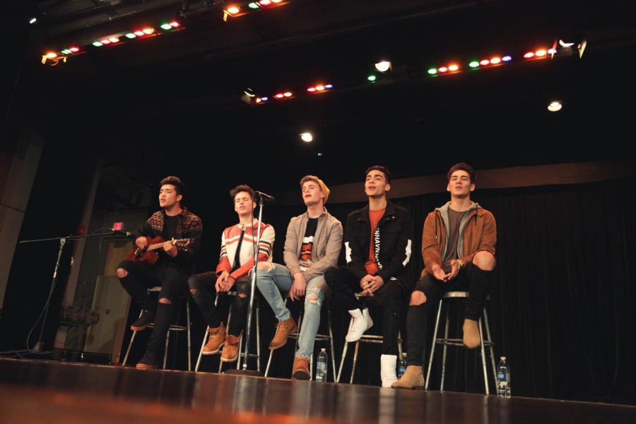 In Real Life performs an acoustic version of "Eyes Closed," their lead single, in Central's Little Theatre. From left: Sergio Calderon, Michael Conor, Brady Tutton, Drew Ramos, Chance Perez