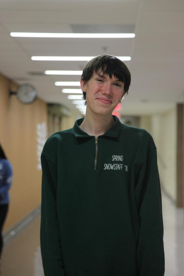 Senior Kevin Otto stands in a hallway of Naperville Central. Otto, who is gender-neutral, emphasizes the importance of providing all students a safe, comfortable environment, especially during prom. Now, [prom is] for everyone no matter how you identify or how you express yourself, Otto said.