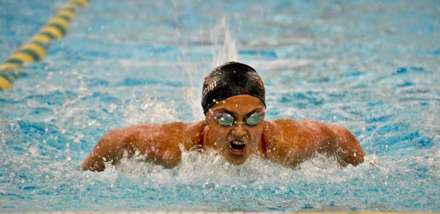 Alexa Puccini swims the 100-yard butterfly on Oct. 11 at Waubonsie Valley.
