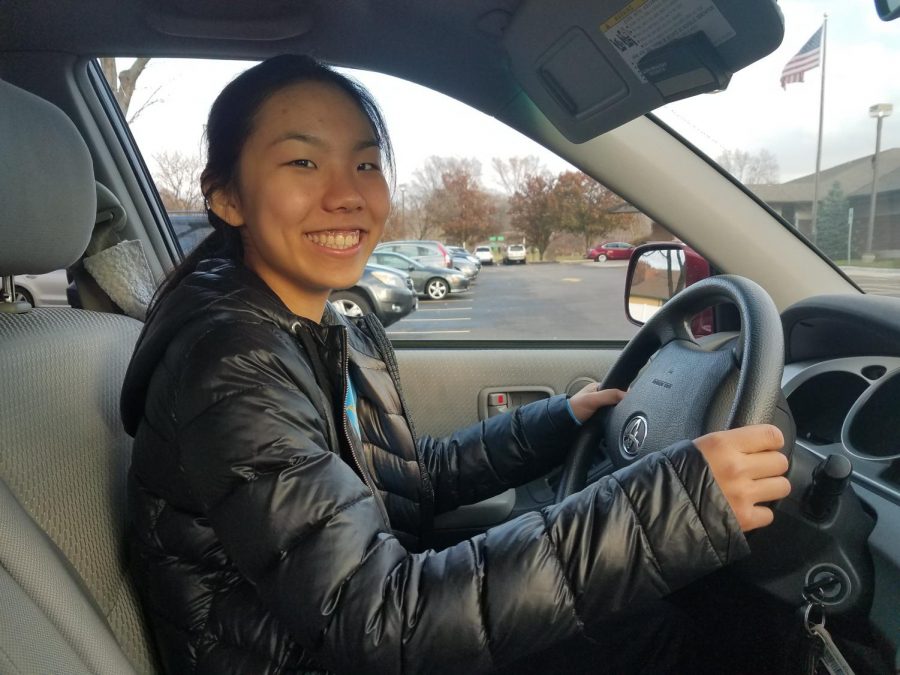 Sophomore Sophia Pei practices her driving skills in the Naper Boulevard Library’s parking lot on Nov. 24.

