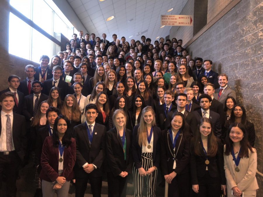 DECA+students+posed+for+a+photo+on+Jan.+23+at+Naperville+Central+after+regionals+in+Rosemont%2C+IL.%0A