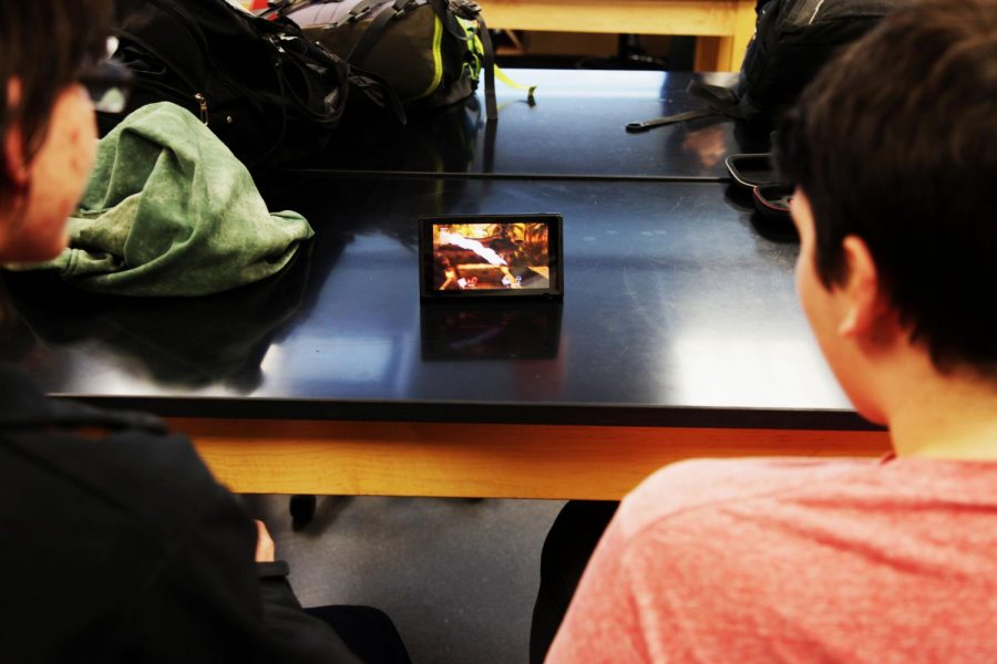 Senior Emile Savard and Junior Doug Koshay play “Super Smash Bros Ultimate” on the Nintendo Switch at Super Smash club after school on Jan. 24, 2019.