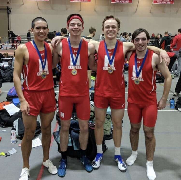 4x800 relay team (left to right): Seniors Thomas Shigalis, Seth Klein-Collins, junior Patrick Julian, and senior Thomas Codo after set a new record at North Central’s Al B. Carius Track on March 4 with a time of 7:57.92.
