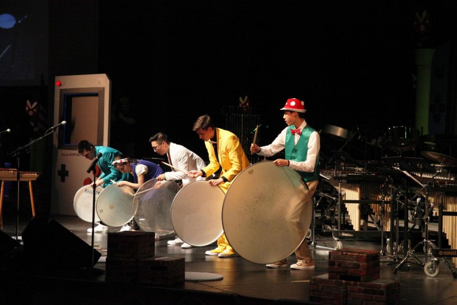 Senior Caleb Frank, junior Tori Charmoli, senior Nathanael Lee, senior John Pohovey and freshman Jeremy Chou performed “Heads up!” by Mark Ford at the Drum Show on April 5 in Central’s auditorium.