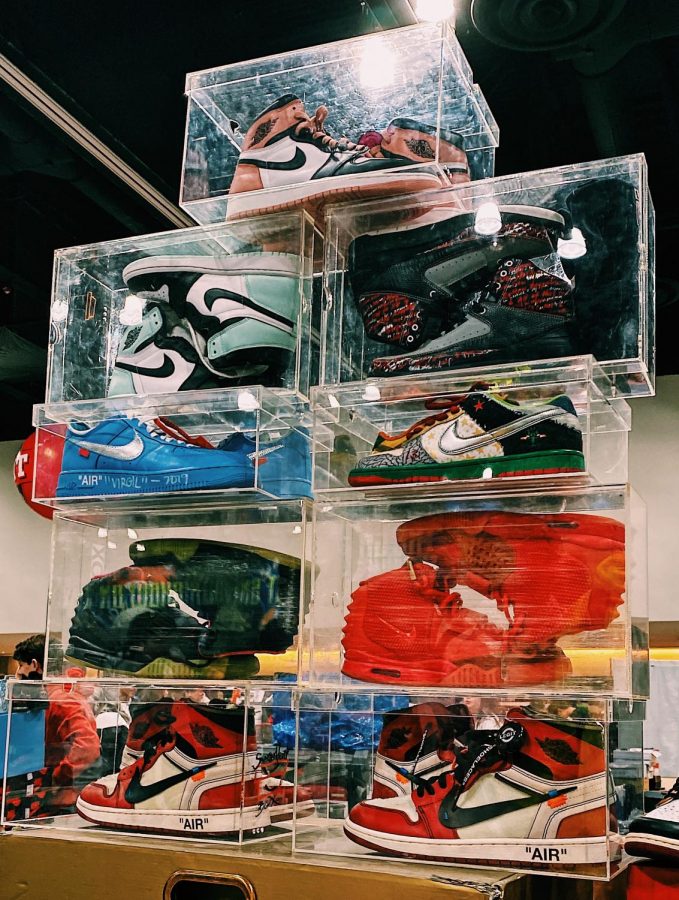 Sneakers are stacked at Sneaker Con.