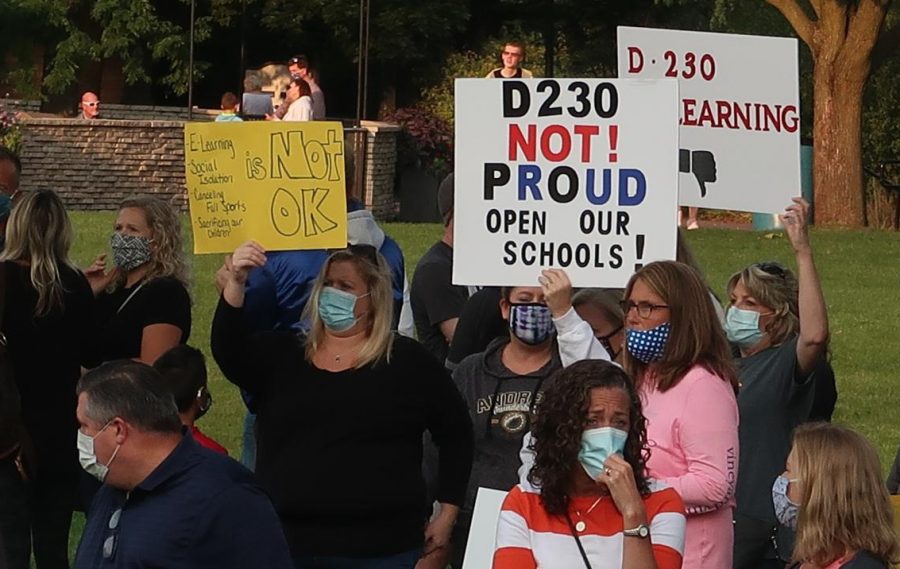 Parents of District 230 students in Orland Park joined parents and students from Naperville 203 and surrounding communities gathered at Rotary Hill on Sept. 21 to demand the immediate return of students to in-person learning. 