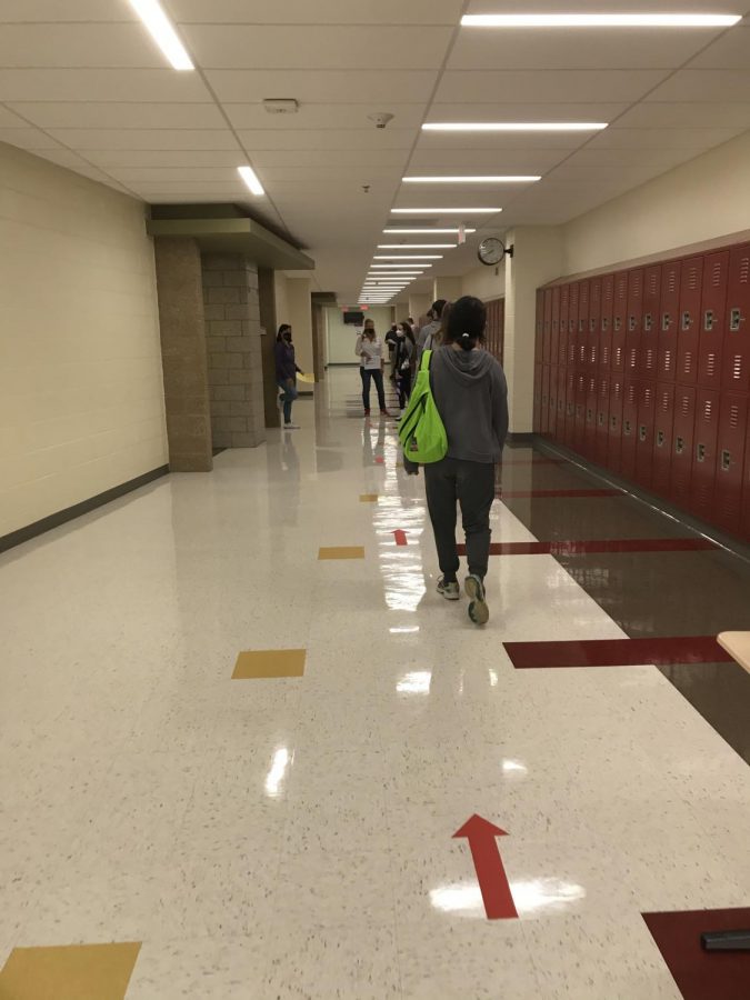 How will social distancing be enforced in hallways during passing periods as more students are brought back in Stage 3?