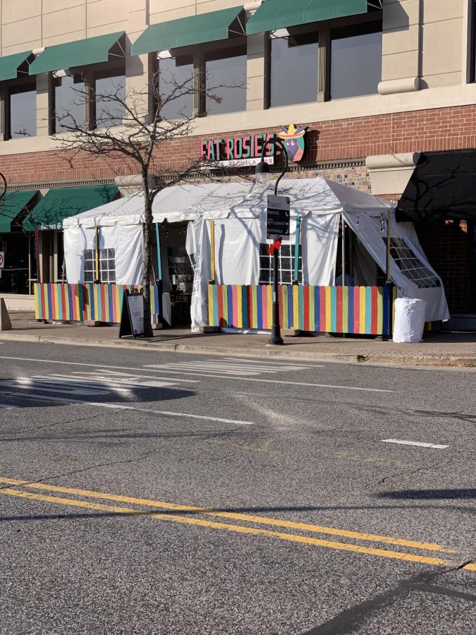 Many local businesses, like downtown restaurant Fat Rosie's, are looking for ways to weather the new restrictions' economic effects.