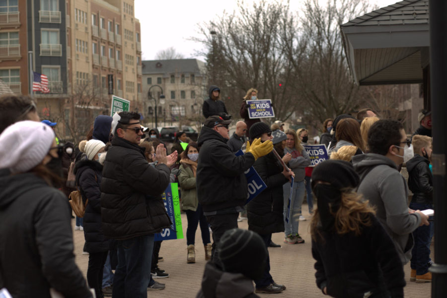 Community members across nine districts demand a return to full in-person learning with activities and lunch at a rally on Sunday, March 14.