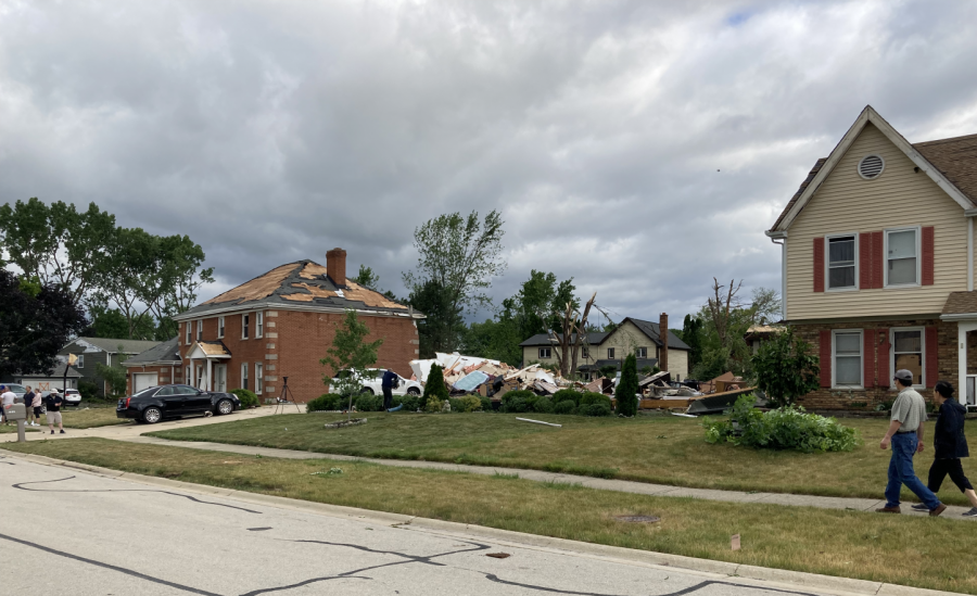 A tornado damaged many Naperville homes on the evening of June 20, completely destroying this home in the Ranchview neighborhood as the homes on either side sustained storm damage but were otherwise spared. 