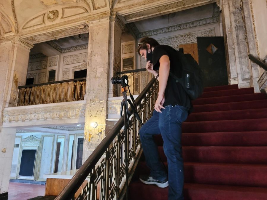 Boonsearm sets up a shot in the old Central Park Theater in Chicago's North Lawndale neighborhood. 