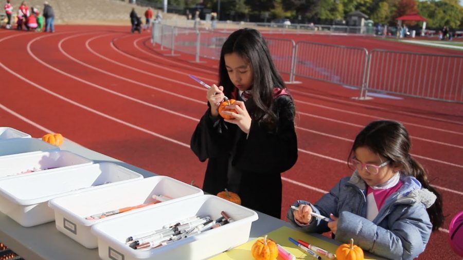 Naperville Central Cheerleading and Arrowettes host first ever TRACK or TREAT - youtube