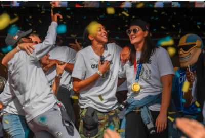 Chicago Sky forward/center Candace Parker, 3rd from left and center Stefanie Dolson, right, celebrate their 2021 WNBA Championship during a rally at Millennium Park on Tuesday, Oct. 19, 2021, in Chicago. (AP Photo/Matt Marton)