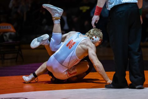Senior Ayden Lutes puts his DeKalb opponent on their back with his legs at dual on Dec. 9 at DeKalb.