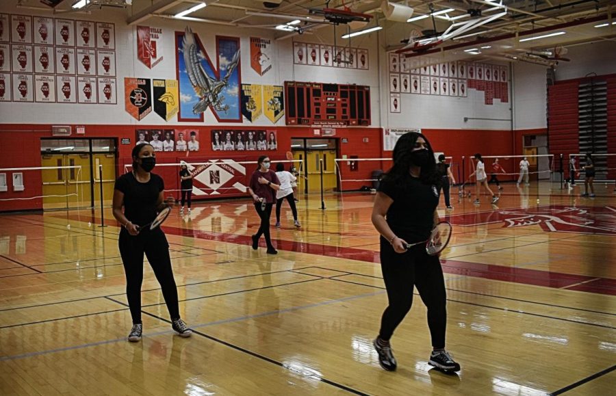 Freshmen Saige Phillips and Amogha Nair practice at the badminton open gym  on Feb. 22. 