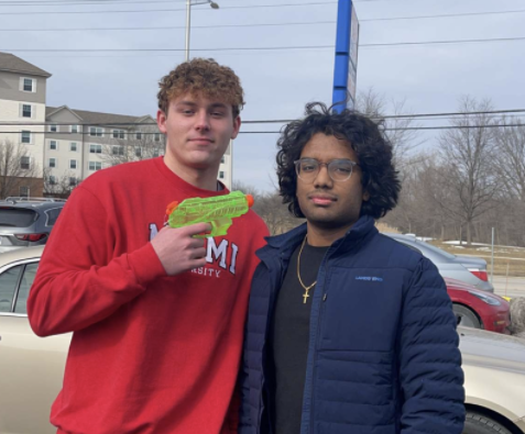 Seniors Seth Lendzion and Suhas Medidi pose for a photo to send as evidence to senior assassin moderators.