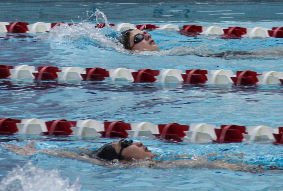 Naperville Central's boys swim team practices after school on Feb. 15 for its upcoming end-of-season push.