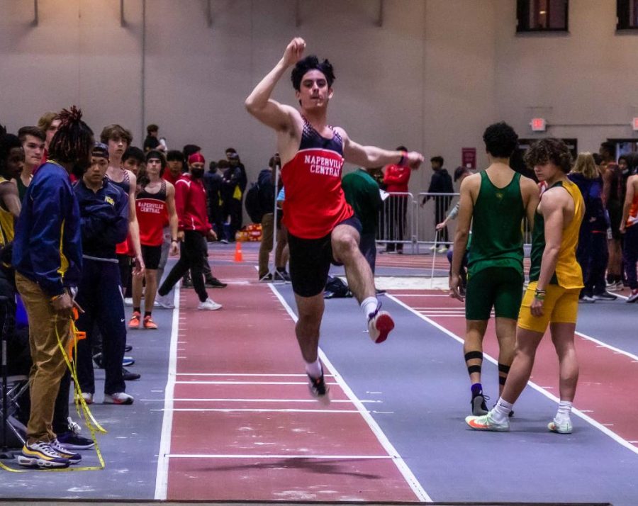 Central+senior+Zach+Wood+flies+through+the+air+as+he+competes+in+long+jump+on+March+18+at+the+indoor+DVC+championship+held+at+North+Central+College.
