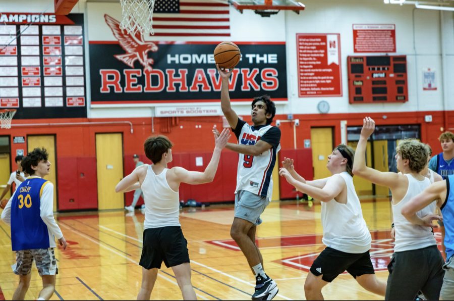 KC Killers member and senior Pratham Amin scores a basket against BBC in the third week of Meadow Glens Runs on April 10.