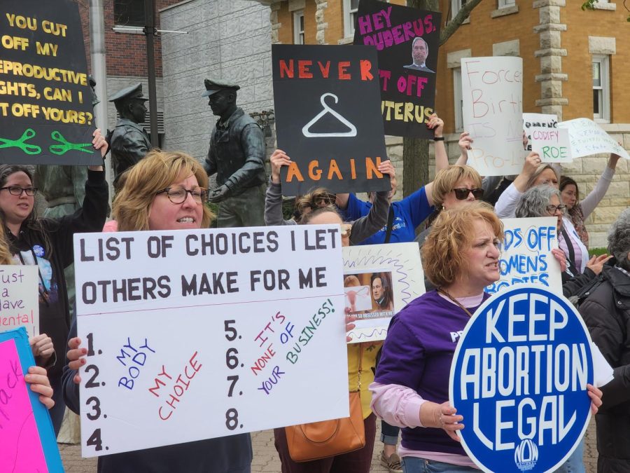 Protestors gather outside the Kroehler YMCA on Washington Street after Samuel Alito's majority opinion draft.