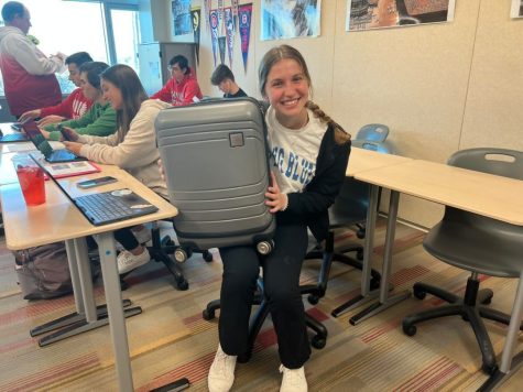 Natallie Duffin brought a suitcase for her school supplies to school on “anything but a backpack day” on April 12.