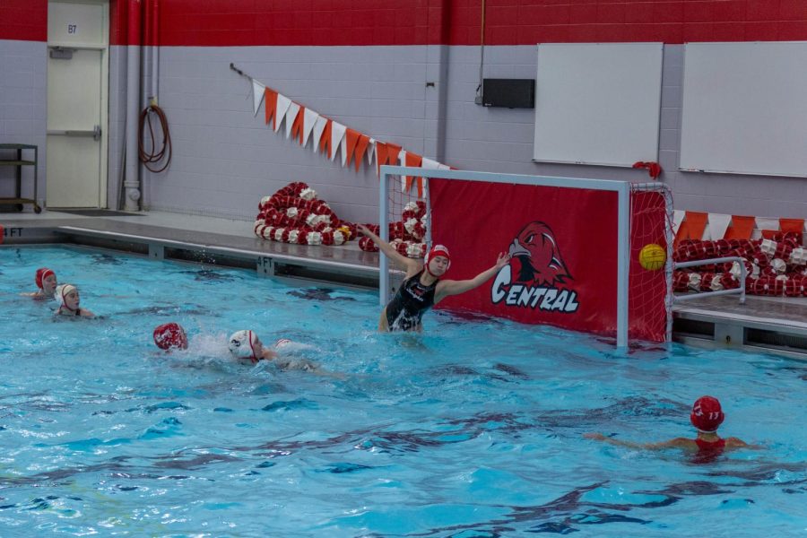 Naperville Central sinks a goal into the net on April 7, against Lincoln Way Central.