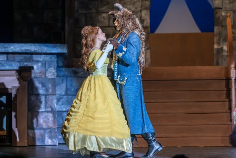Belle (senior Natalie Brodnick) and the Beast (junior Jake Howard) dance to the song Beauty and the Beast in Theatre Centrals production of Beauty and the Beast on May 1.