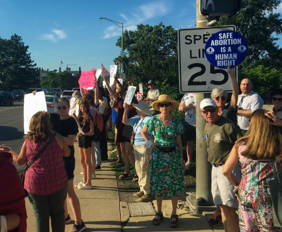 Various residents participating during the protest on June 24 by the intersection of Washington Street and Aurora Avenue.