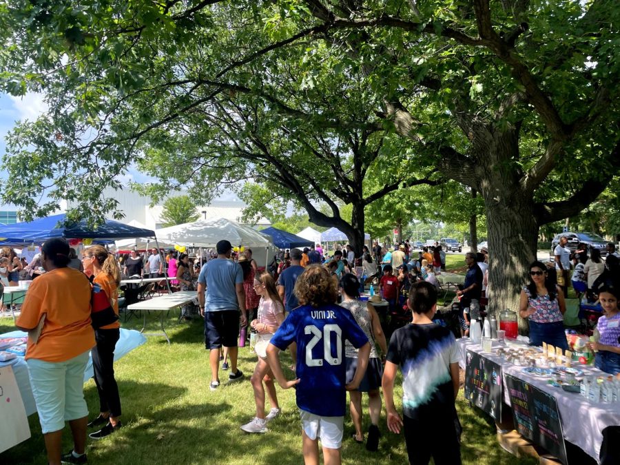 Customers walk the aisles of the  Naperville Childrens Business Fair.