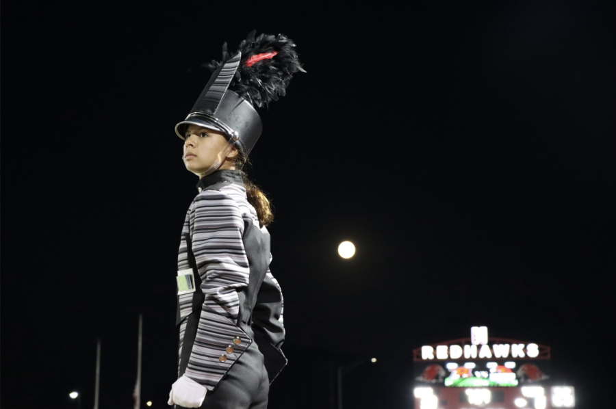 Bianca Cima conducts the Marching Redhawks on Sept. 9 at Centrals Memorial Stadium