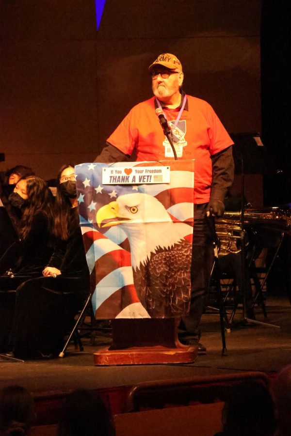Army veteran Charlie Vladika addresses the auditorium at Central's Veterans Day Assembly on Nov. 10.