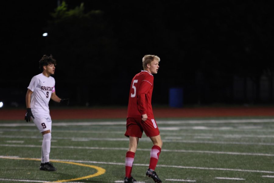 Central+forward+Carter+Adams+watches+the+play+down+the+field.+With+his+father+as+the+varsity+soccer+coach%2C+Carter+and+his+brother+Chase+grew+up+in+a+world+of+soccer.