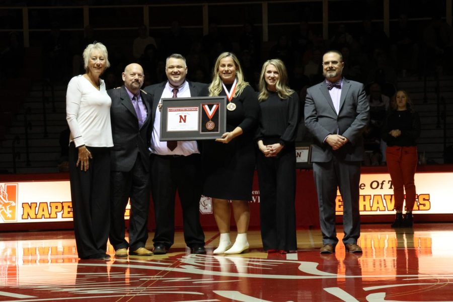 Abbey Kerth holds hall of fame plaque after receiving it on Feb. 3. 