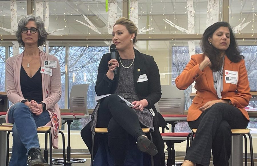 Naperville City Council candidate Ashley South (center) discusses sustainability at a panel discussion hosted by Naperville Central students.