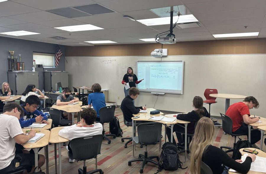 Central math teacher Marissa Rakes teaches her Honors Precalculus class. Honors Precalculus will be converted to AP Precalculus BC at Central in two years, following District 203s approval of new AP Precalculus courses. 