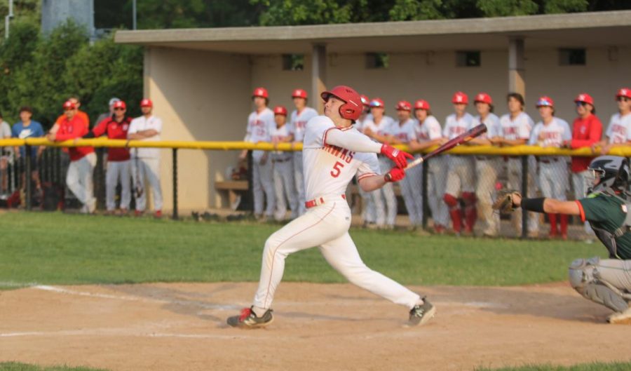 Senior center fielder Clay Schrader hits a fly out into left field. The out was both the last of Centrals 4-1 loss to Plainfield East and of the Redhawks season.