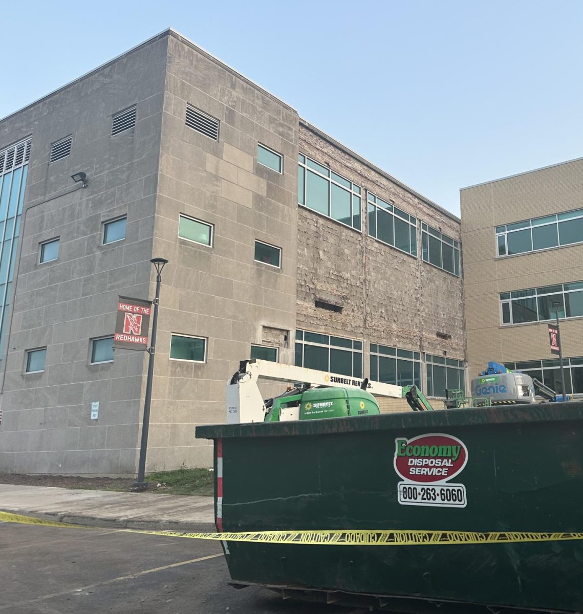 A wall at Central had exterior bricks removed after District 203's Board of Education gave emergency approval for repairs of exterior walls near Central's little Theatre and door 7.