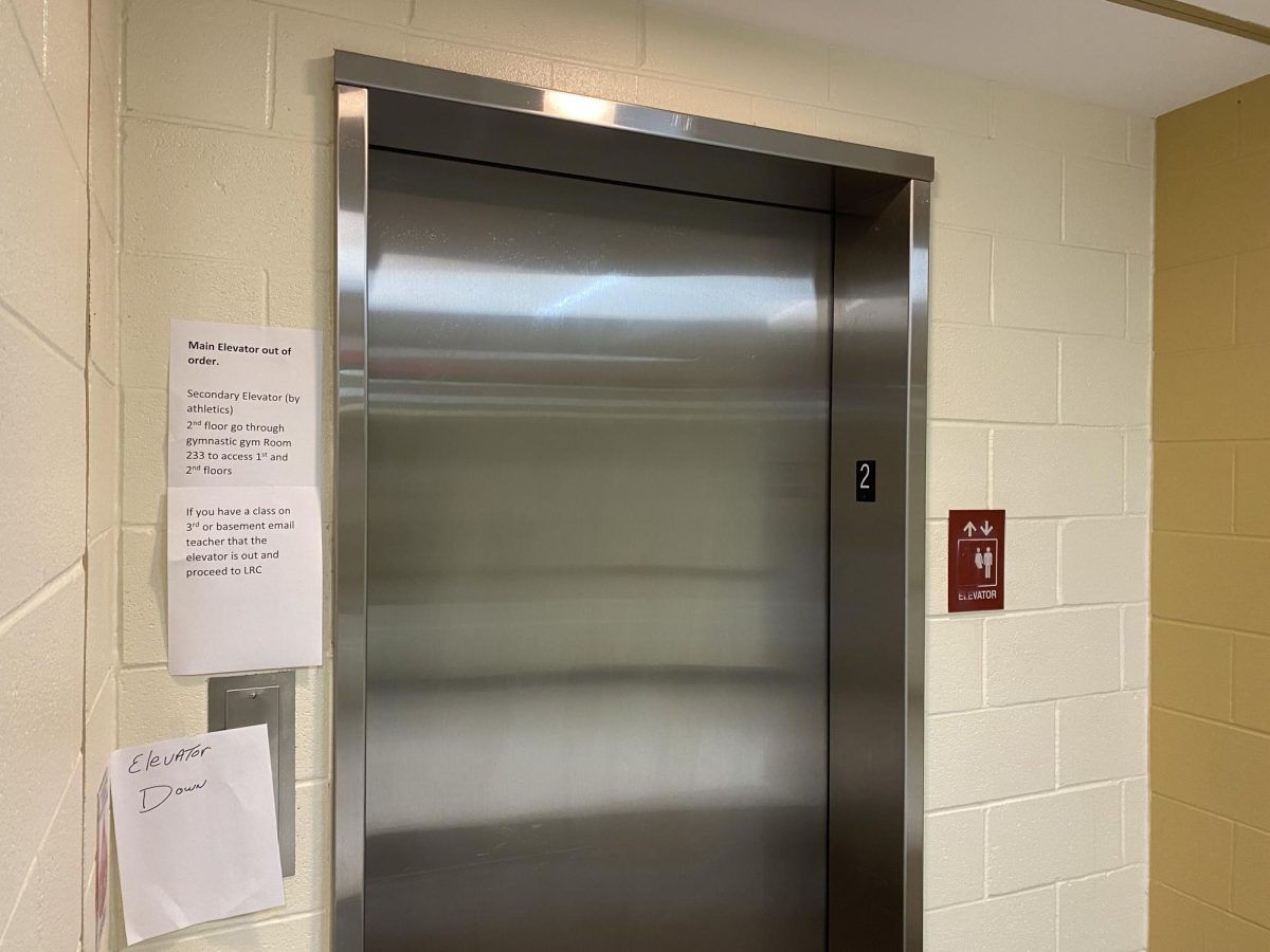 Signs redirect students from Central's main elevator after it broke down on Aug. 29. 