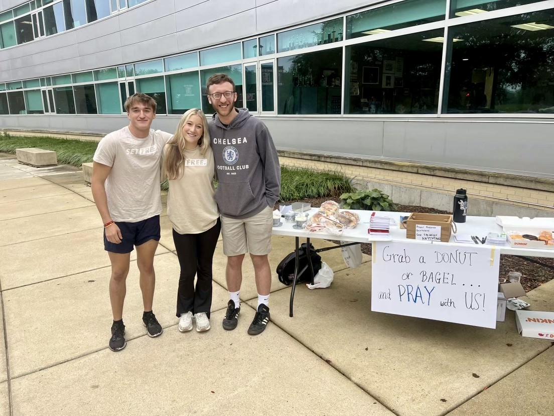 Caleb Coleman (left) began homeschooling this year while still leading Anchored — Central's Christian youth group — with the help of co-leader Junior Fiona Holba 