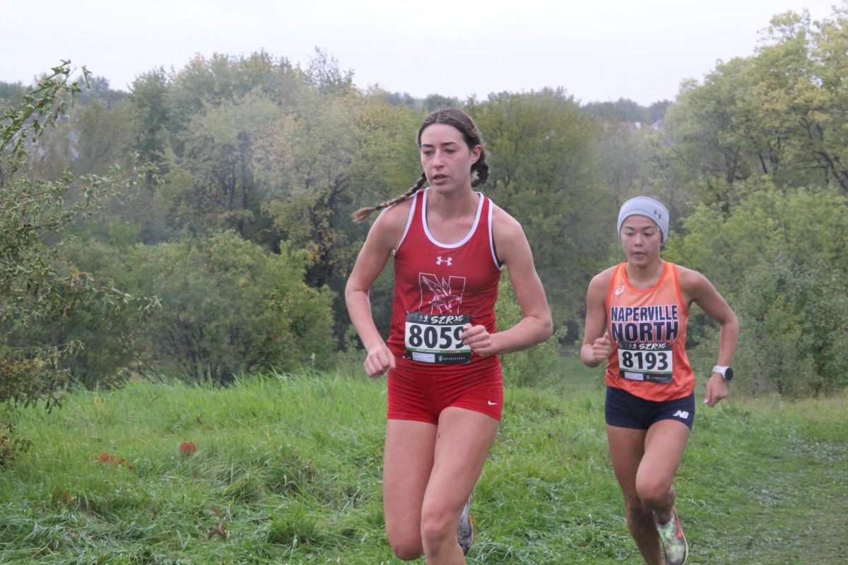 Senior+Liv+Phillips+runs+at+the+DVC+cross+country+meet+on+Oct.+4.+Phillips+would+go+on+to+finish+in+second+place+at+the+IHSA+State+Championship+on+Nov.+4.+