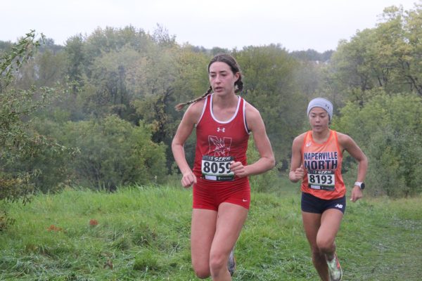 Senior Liv Phillips runs at the DVC cross country meet on Oct. 4. Phillips would go on to finish in second place at the IHSA State Championship on Nov. 4. 