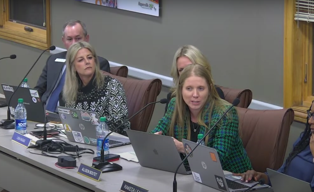 Allison Boutet, Assistant Superintendent for Administrative Service, explains the changes to Junior High Spanish and French teachers at the Dec. 4 Board of Education meeting. (Photo Credit: District 203)