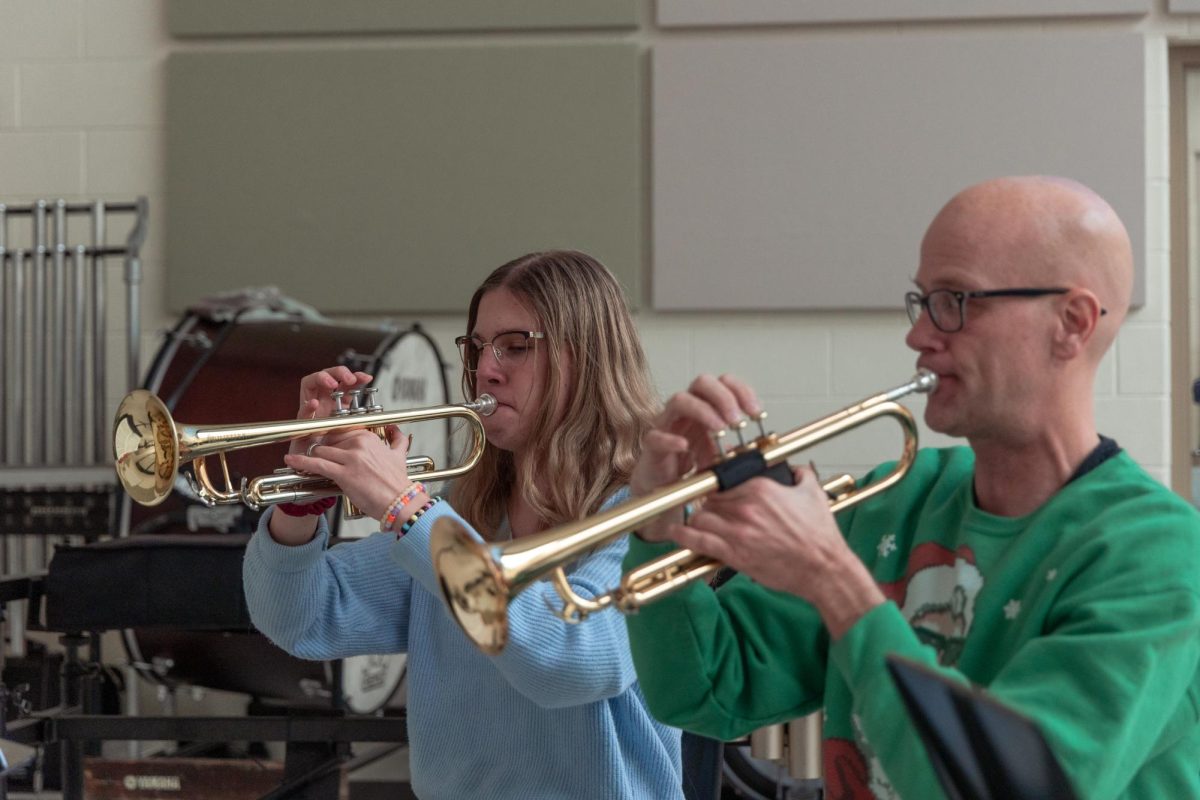 Sophomore June Waidler practices with band director D.J. Alstadt at a lunchtime technique lesson in Centrals band room. Waidler is one of several students Alstadt works with as a part of technique.