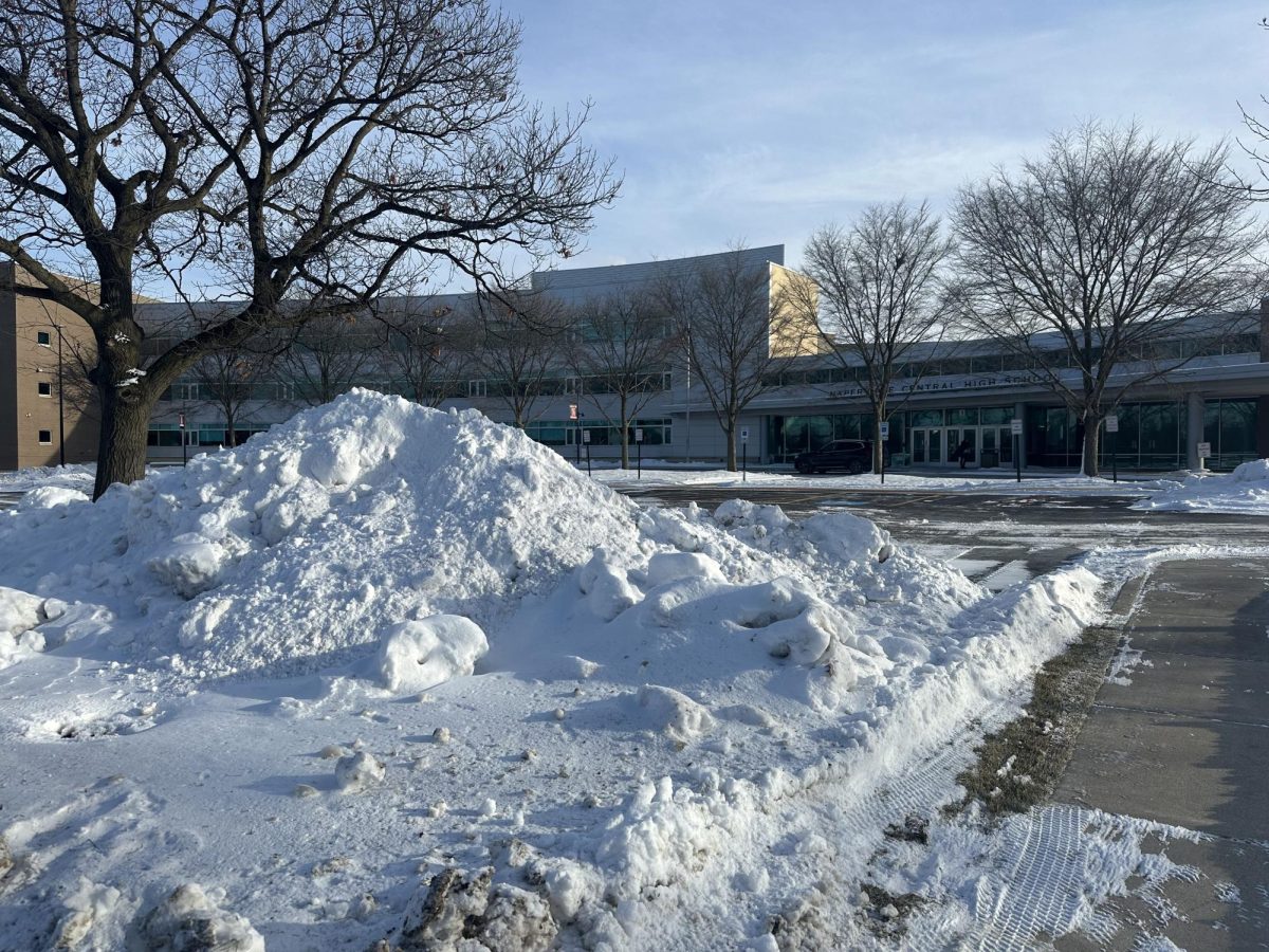 Snow piles up in front of Central on Jan. 15, after 6.5 inches of snow fell on Jan. 12 and 13. An e-learning day was called on Jan. 12 due to the snow, and on Jan. 16 due to an ensuing cold front.