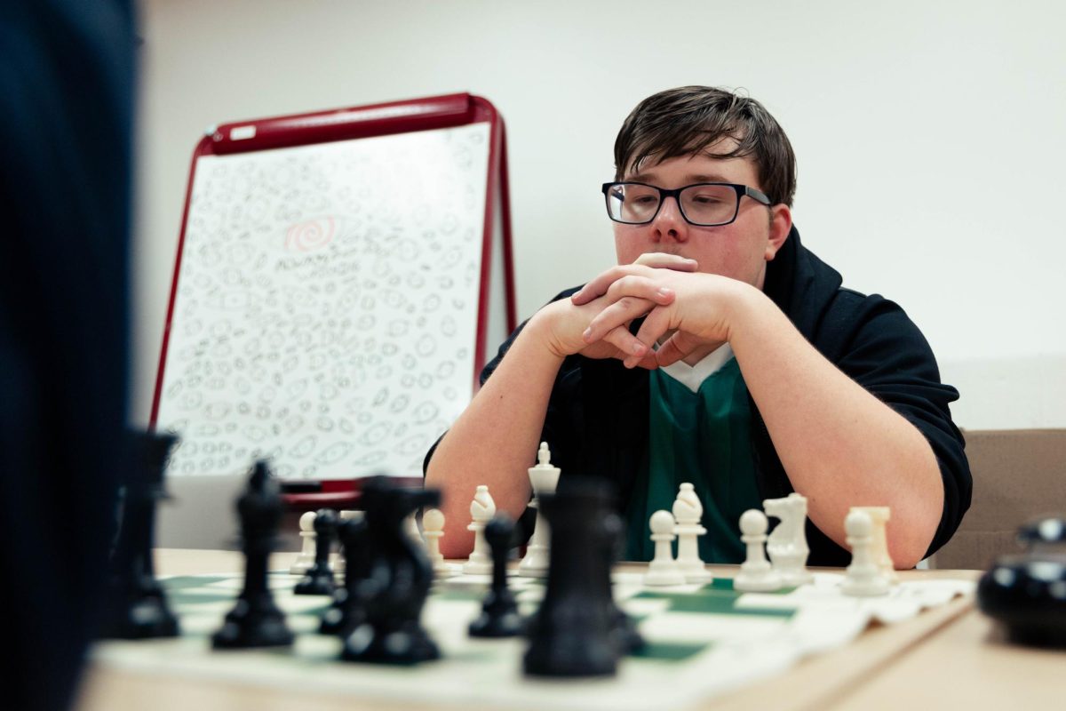 Central senior Braeden Rodemeyer ponders his next move at a chess team practice on Jan. 18.